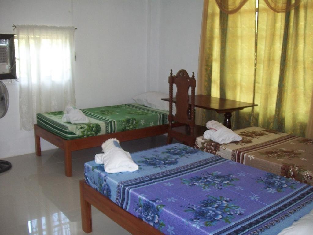 Charm Guest House Puerto Princesa Værelse billede